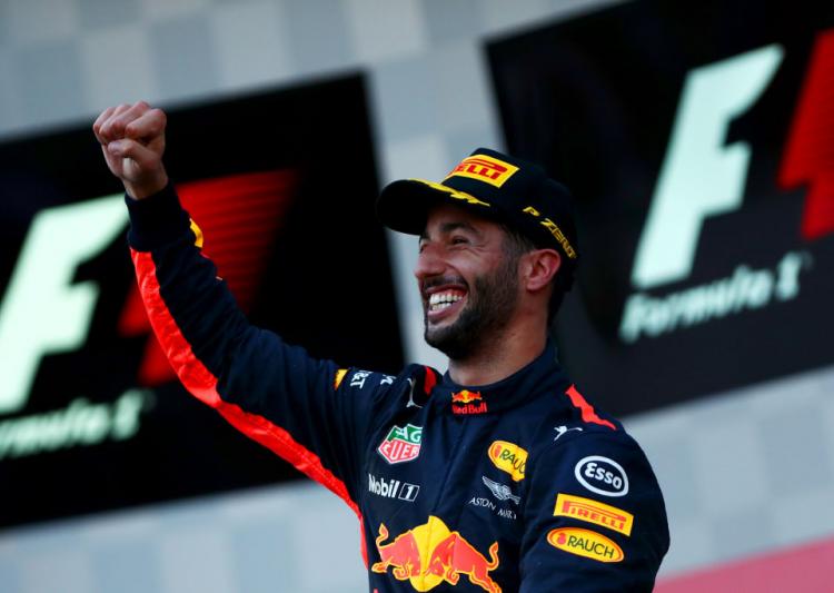 Ricciardo wins action-packed race as Vettel and Hamilton clash