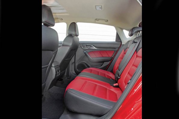 The red and black interior looks sporty.